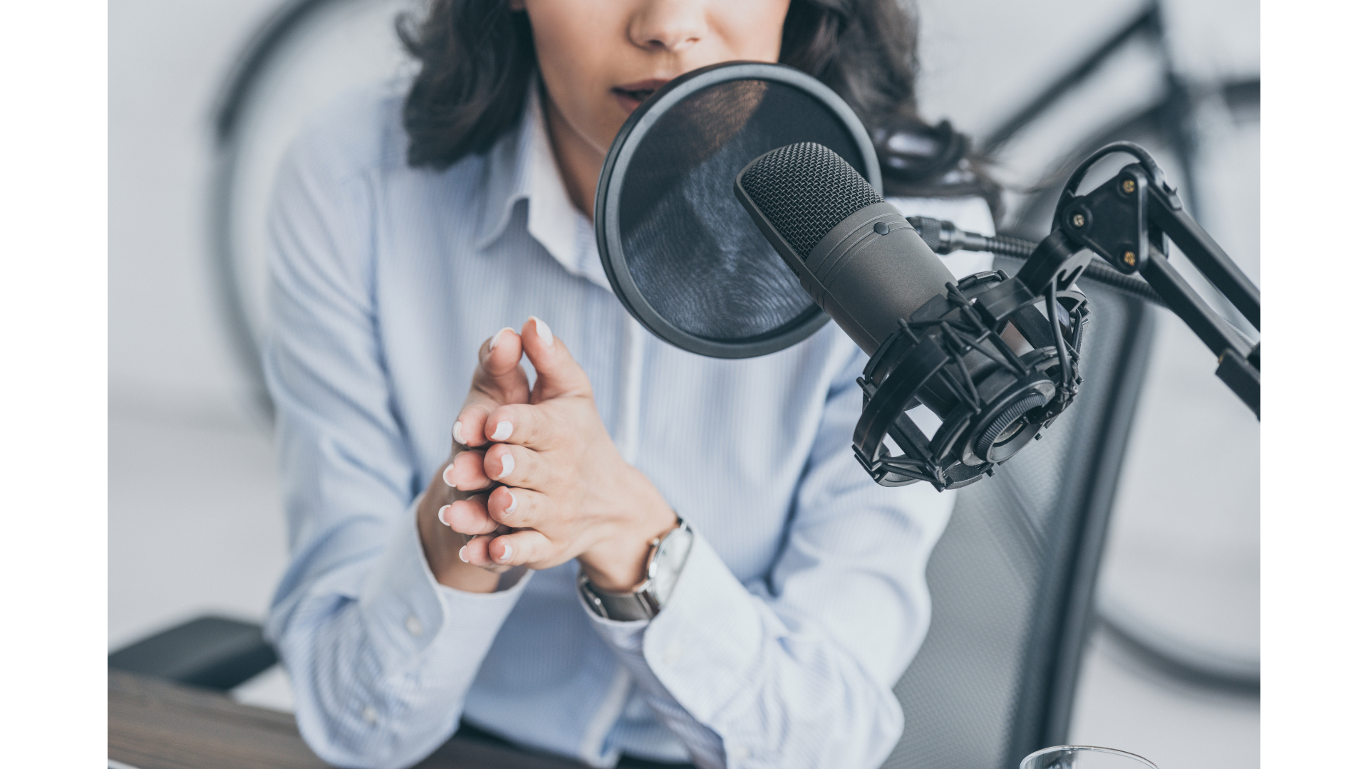 Woman hosting a podcast