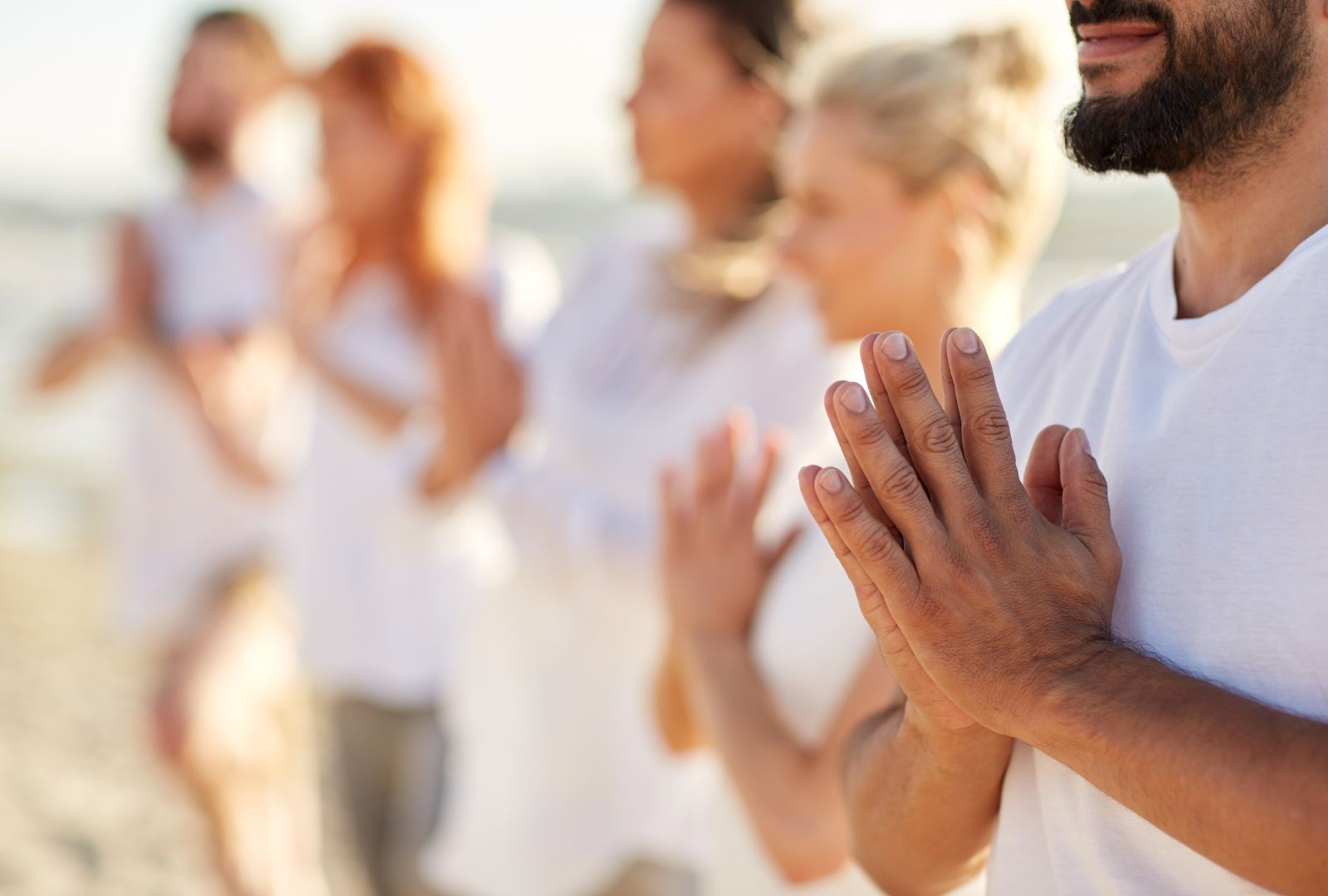 People Meditating Outside